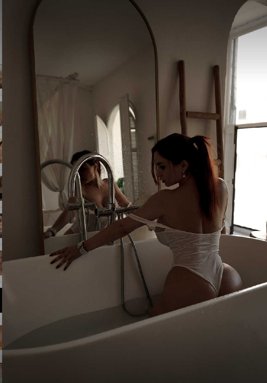 A playful frame from Miranda Faith nude — online in Thane